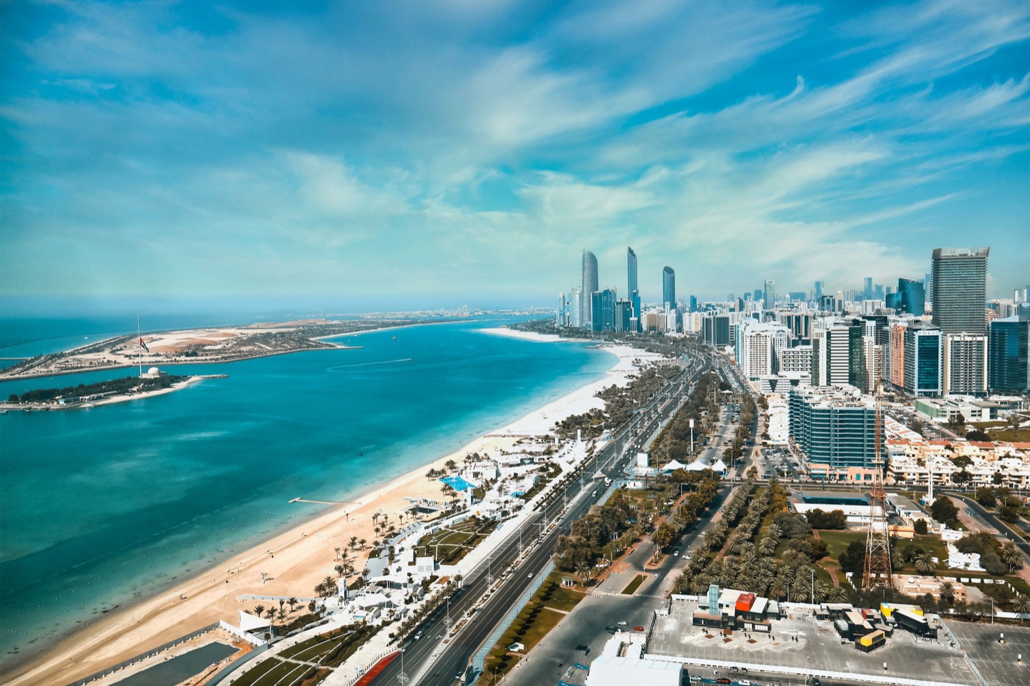 Aerial view of the Abu Dhabi Corniche beach and the towers behind it