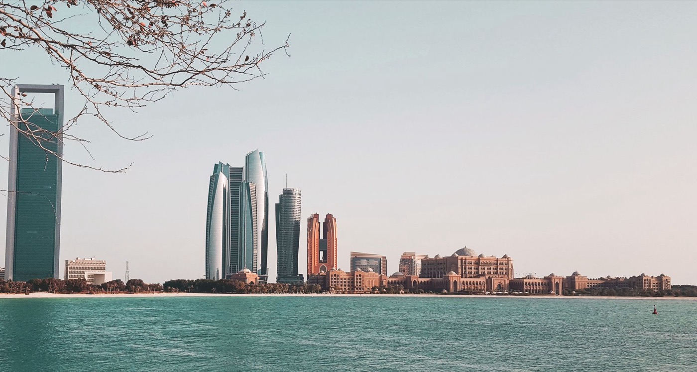 Abu Dhabi towers seen across the water from the shoreline